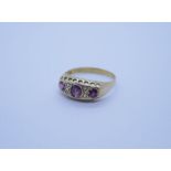 Antique 18ct yellow gold dress ring, set with rubies and diamonds central stone replacement, not rub