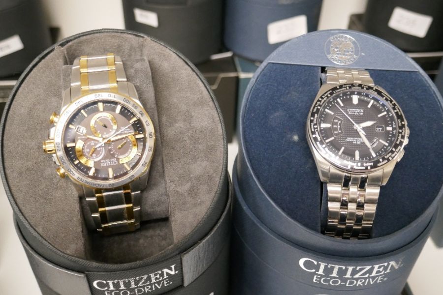 A pair of Citizen Eco-Drive watches case no.s E650-SO75157 Purchased Jan 2014 and H145-SO73316 Purch