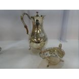 A large silver Mappin and Webb Edwardian hot water pot of baluster form. The rim has a scallop desig