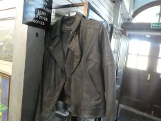 A ladies "Mint Velvet" grey leather jacket, size 16