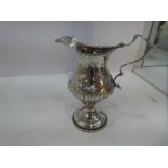 A very pretty Georgian silver creamer by Hester Bateman. A high quality decorative piece having acan