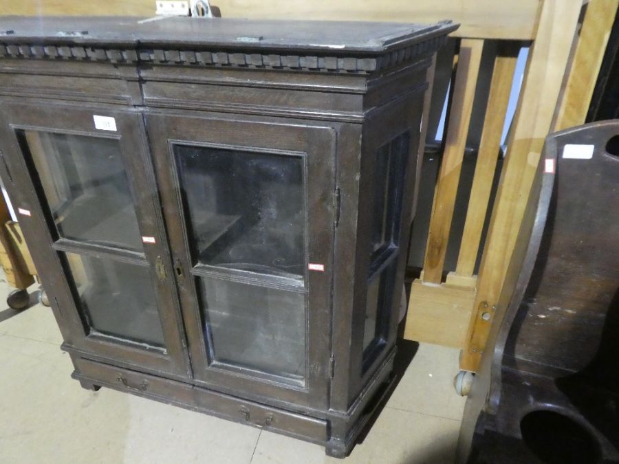 An antique oak glazed bookcase having two drawers, a small child's chair and a stool - Image 2 of 3