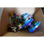 A box of Teenage Mutant Ninja Turtles plastic toys and figures