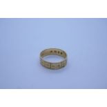 18ct yellow gold wedding band with engraved panel detail, marked 18 size K/L, 2.8g approx