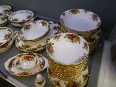 A quantity of Royal albert Old Country Roses dinnerware to include three large vegetable dishes