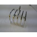 A silver toast rack by Docker and Burn Ltd, Birmingham 1923, 2.66 ozt approx