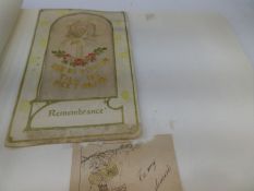An album of First World War silk postcards and similar