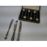 A cased set of silver William Suckling Ltd teaspoons, Birmingham 1925, two silver handled knives by