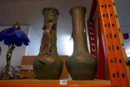A pair of Art nouveau plaster vases, decorated maidens, stamped with maker's marks to reverse, 56cms