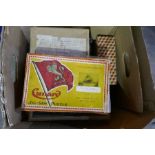 A box of vintage puzzles including Cunard shipping wooden puzzle