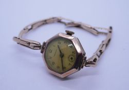 9ct gold ladies wristwatch case marked 375, strap marked 9ct, weight without movement and glass appr