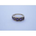 9ct yellow gold amethyst and diamond chip ring, size N/O; 3.2g approx