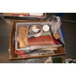 A box of mixed crafting items, mostly relating to leatherwork