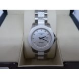 LONGINES; a ladies Longines Conquest wristwatch, stainless steel and white bracelet, with Mother of