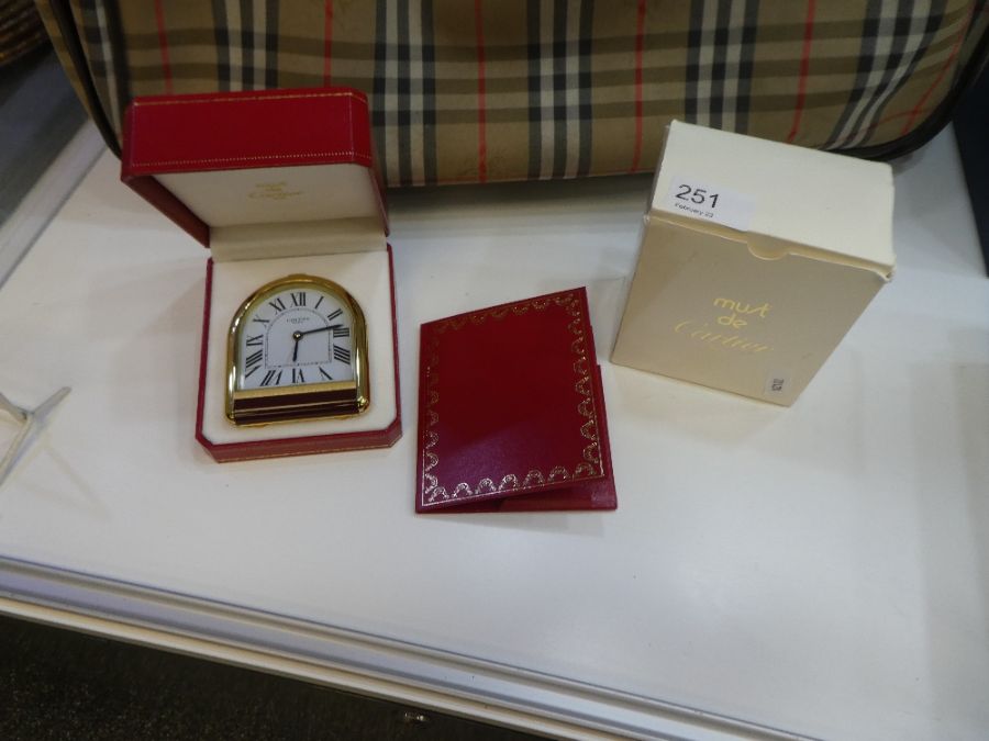 CARTIER; A modern Cartier travelling clock in original fitted case with associated paperwork