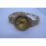 ROLEX; Ladies 18ct Gold Rolex Oyster Perpetual DATEJUST watch complete with a diamond studded