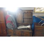 A reproduction oak dresser and rack back, the base having three drawers on cabriole legs, 137cms