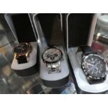 Three modern Lorus Mens wristwatches, boxed