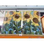 A pair of painted cupboards decorated sunflowers