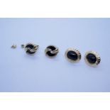 Two pairs of 9ct gold oval earrings inset black stones, both marked 375