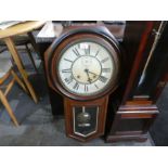 An old American drop dial wall clock with octagonal frame