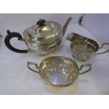 A London silver tea service by James Hardy and Co.  Comprising a teapot, sugar bowl and milk jug on