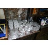 A quantity of glassware including decanters, a Waterford bowl and 6 Waterford Champagne saucers