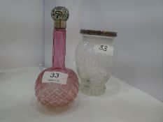 A very pretty, Victorian cut red glass bottle with ornate decorative oval body and patterned neck, S
