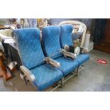 A set of three vintage Aeroplane seats, possibly from a Boeing 737