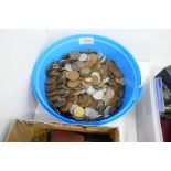 A tub of mixed coinage, mainly copper