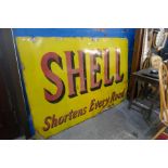 A mid century large enamel sign for Shell "Shortens Every Road" Oil company, 183 cm x 122 cms, singl