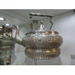 A large metal coffee pot, approximately 34cm diameter body. An ornate coffee bean design and floreat