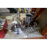 A selection of nice silver plate including toast rack, egg cups and a teapot