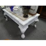 A painted oblong coffee table and one other having glass top