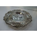 A sterling silver fruit bowl having a very decorative design of pierced pattern and embossed floreat
