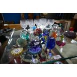 A quantity of paperweights and other glassware