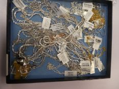 Tray contain a quantity of silver neck chains, of various designs, all as new, all marked and some h