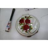 A very impressive silver compact having an attractive decorative enamel front of Red Roses. High qua