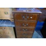 A repro pillar chest having 6 drawers