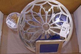 A silver and glass Art Deco wine coaster having pierced silver mounted top in a flower design. Hallm
