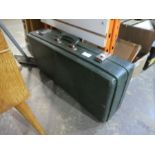 A green leather effect Saxophone case