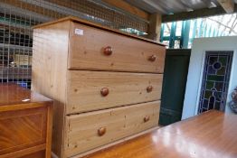 two wooden chest of drawers