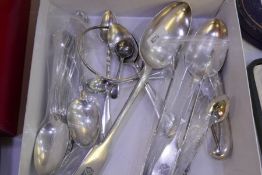 A silver teaspoon, a sterling Canadian teaspoon having enamel Maple leaf terminal and a silver handl