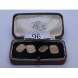 Pair of 9ct yellow gold tapered square cufflinks with machined decoration marked 9ct, maker EAP, in