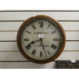 An antique circular wall clock by Aldred & Son, Great Yarmouth, with fusee movement. The dial 12" ap