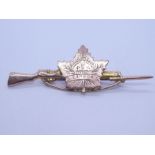 First World War 'Canadian Military Forces Sweetheart brooch' in of the form of a miniature cap badge