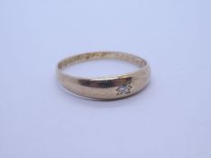 18ct yellow gold gypsy ring with single diamond in starburst setting marked size W/X, approx 3.6g