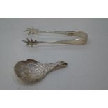 Eagle's wing a modern silver caddy spoon having highly decorative embossed body showing detailed ful