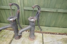 Heavy cast iron water pump embossed with the letter 'N'