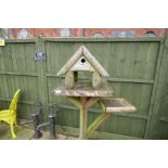 Large wooden freestanding covered bird table